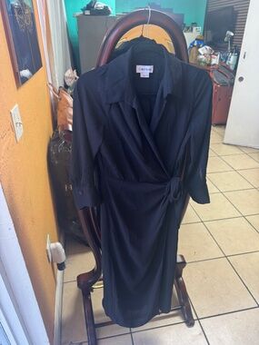 Black Semi-formal wrap around dress ! Only worn once ! Size 10
